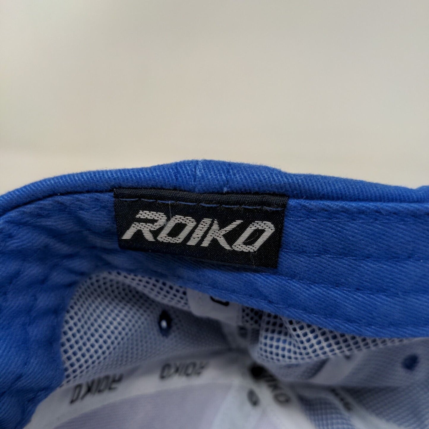 Roiko Slideback Hat Blue One Size Adjustable Emblem Vented Holes 6 Panel