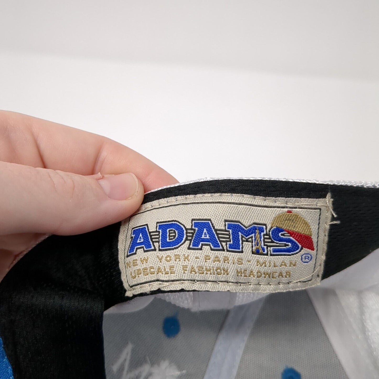 The Palm & Shell Captiva Strapback Trucker Hat Blue One Size Mesh Back