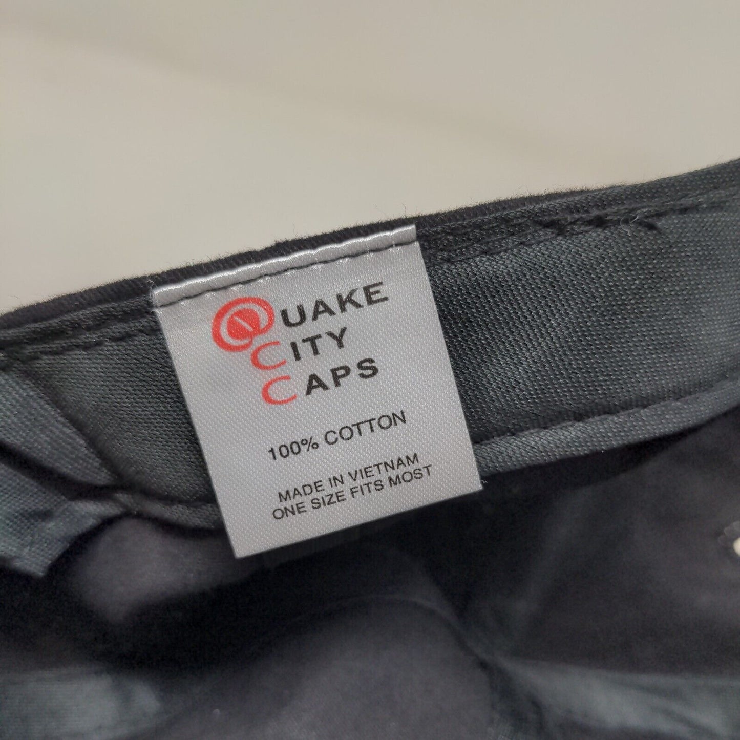Quake City Caps Men's Slideback Hat Black OSFM Embroidered EZGO Logo Cotton