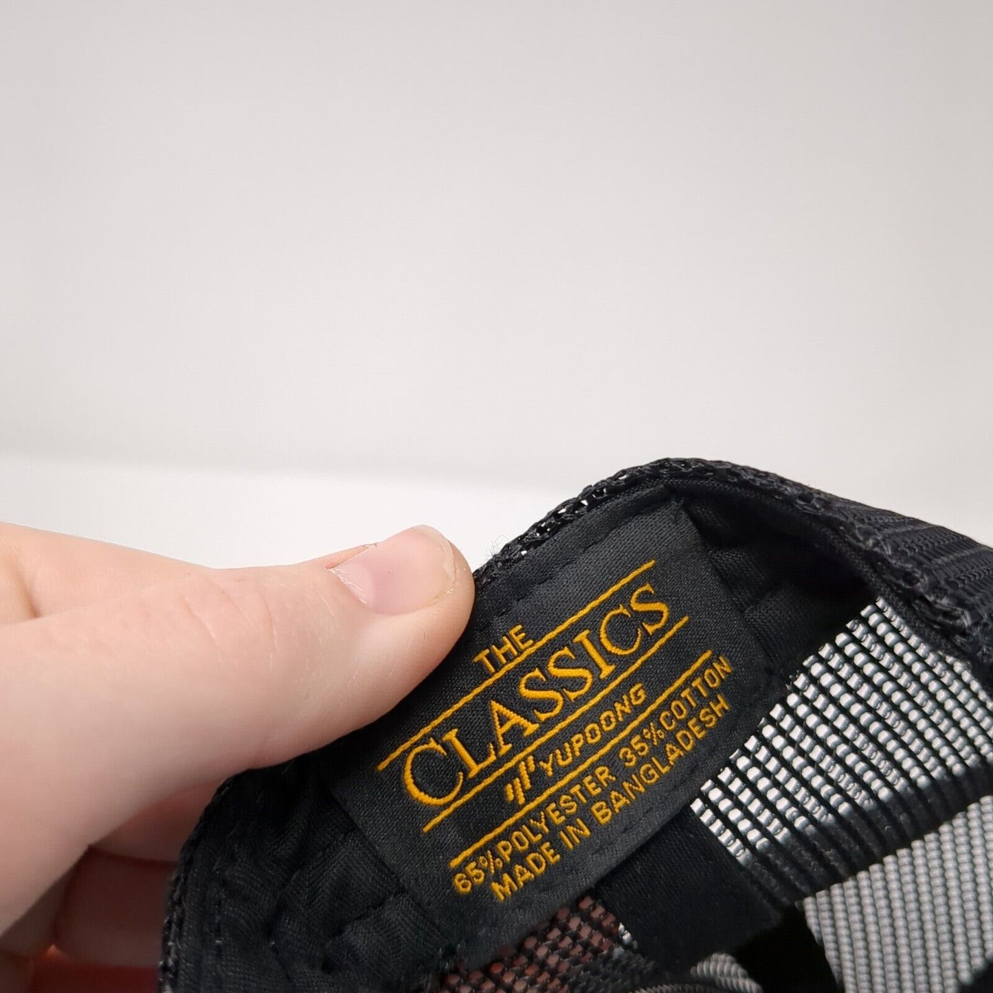 The Classics Yupoong Snapback Mesh Back Trucker Hat Gray One Size Logo