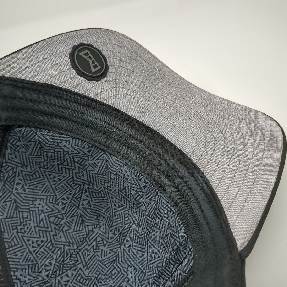 Melin Trucker Hat Black Gray OSFM Camo Hydro Perforated Rubber Logo Adjustable