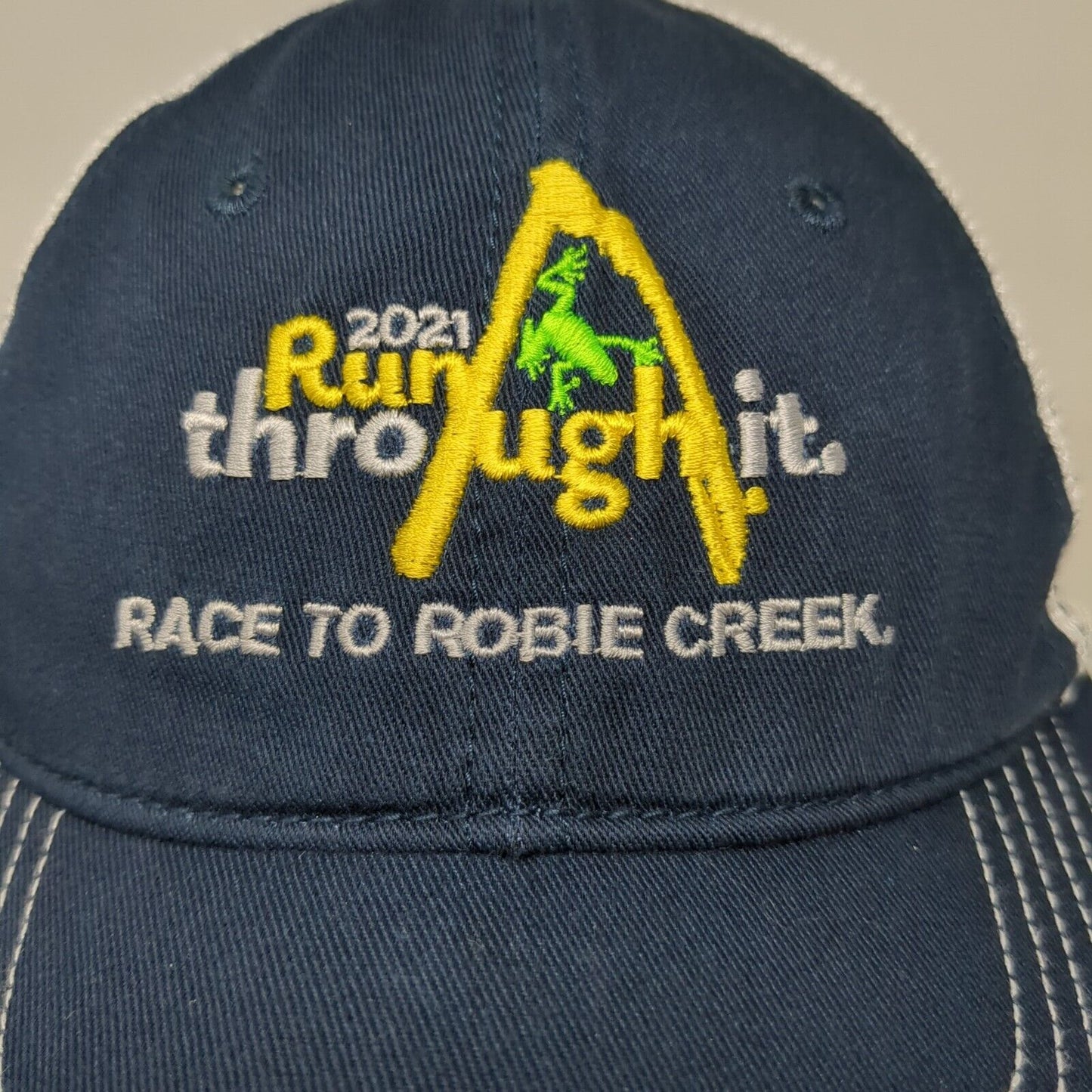 2021 Run Through It Strapback Mesh Back Trucker Hat Blue One Size District