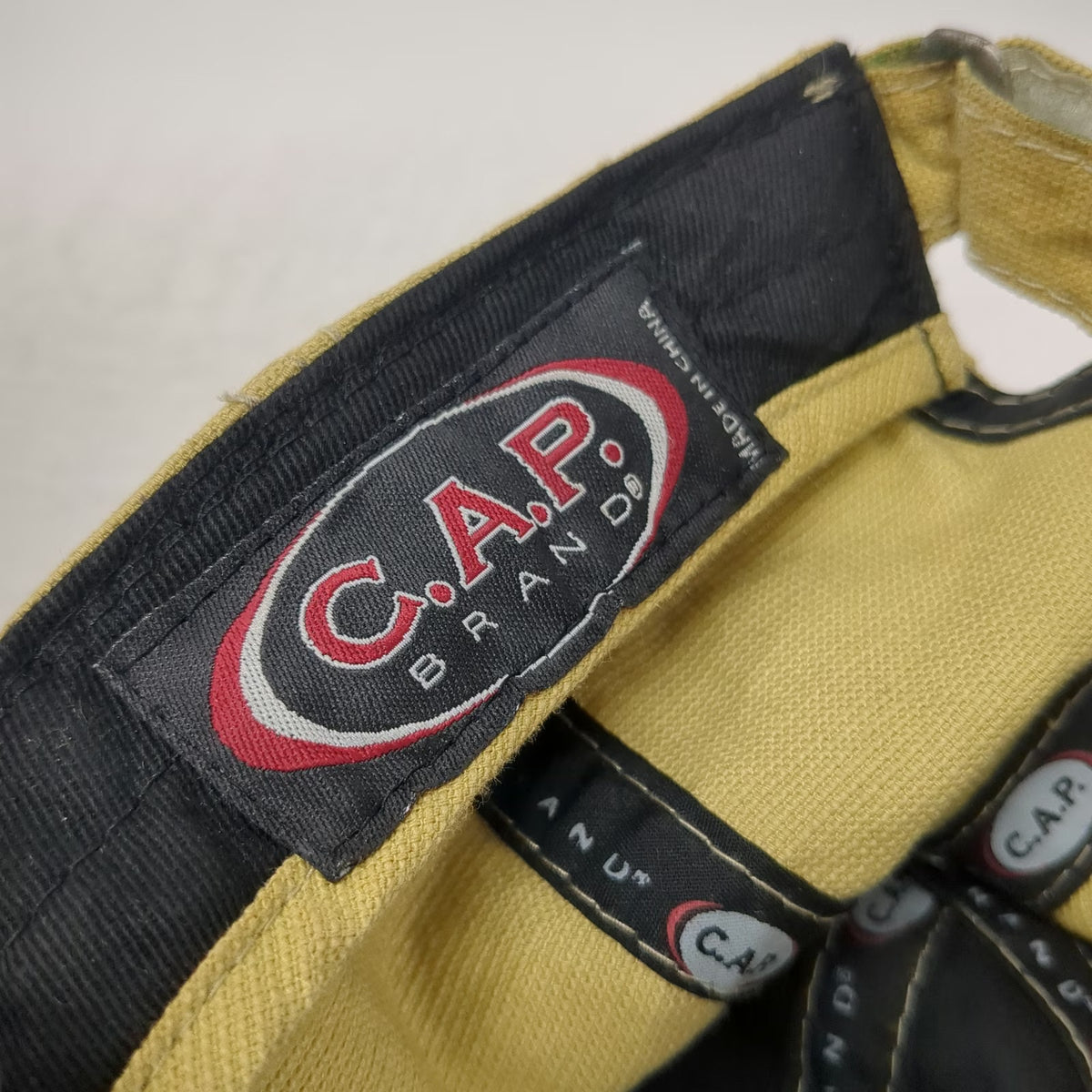 C.A.P. Brand Baseball Cap Beige Black One Size Embroidered Logo Strapback hat