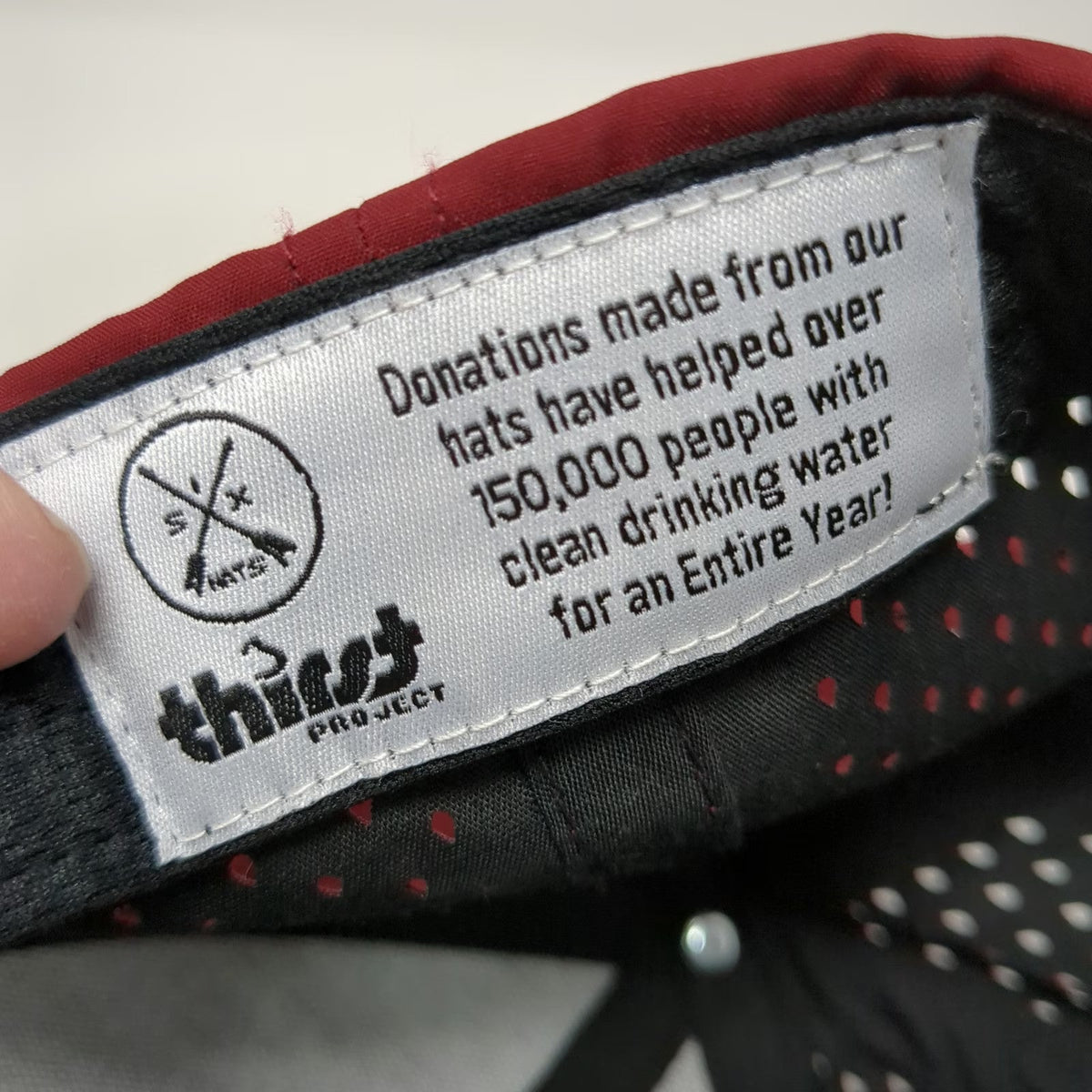 Six Trucker Hat Red One Size Rope Performance Laser Cut Snapback Thirst Project