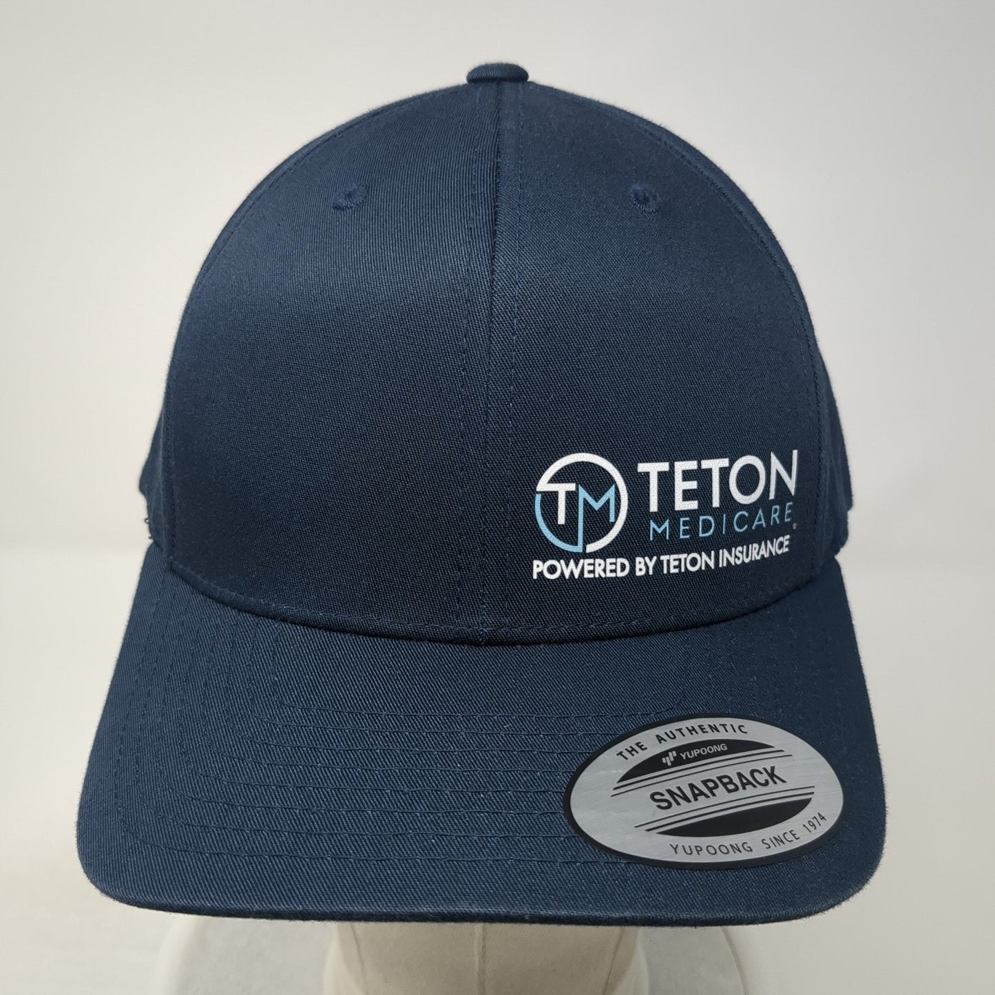 Teton Medicare Insurance Snapback Hat Blue One Size Adjustable Classics Yupoong