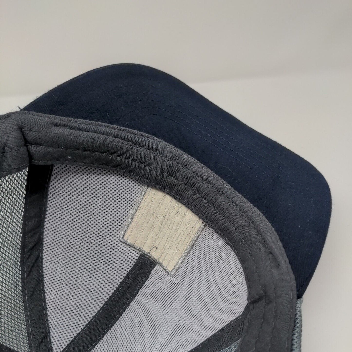 We Stand Together To Reinvent The Way Our World Is Built Trucker Hat Blue OSFA