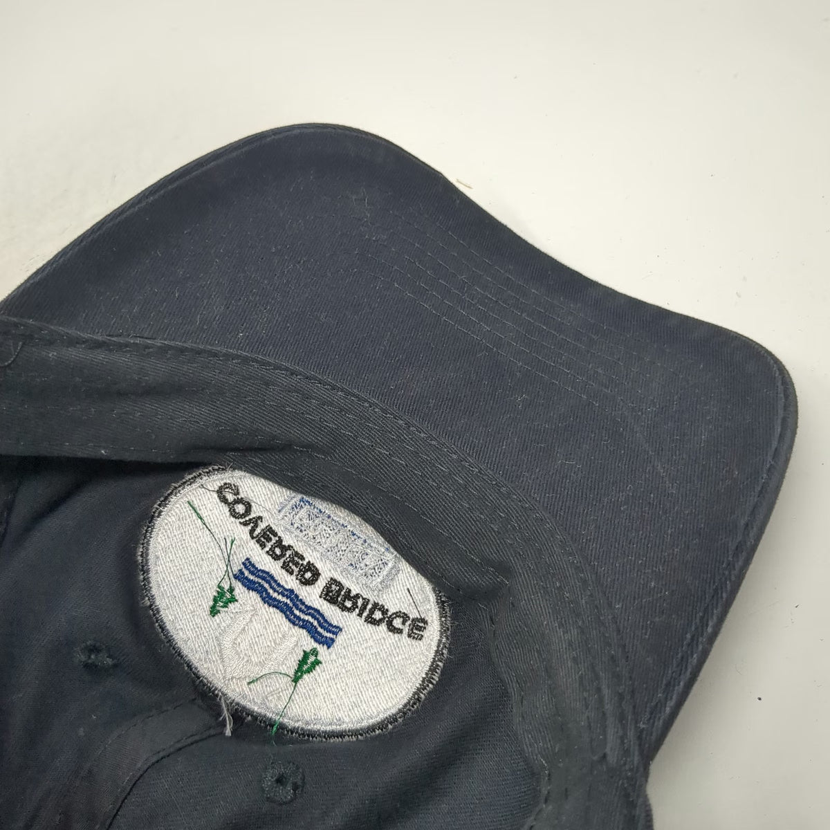 Port & Company Baseball Cap Black One Size Covered Bridge Forge Slideback Hat