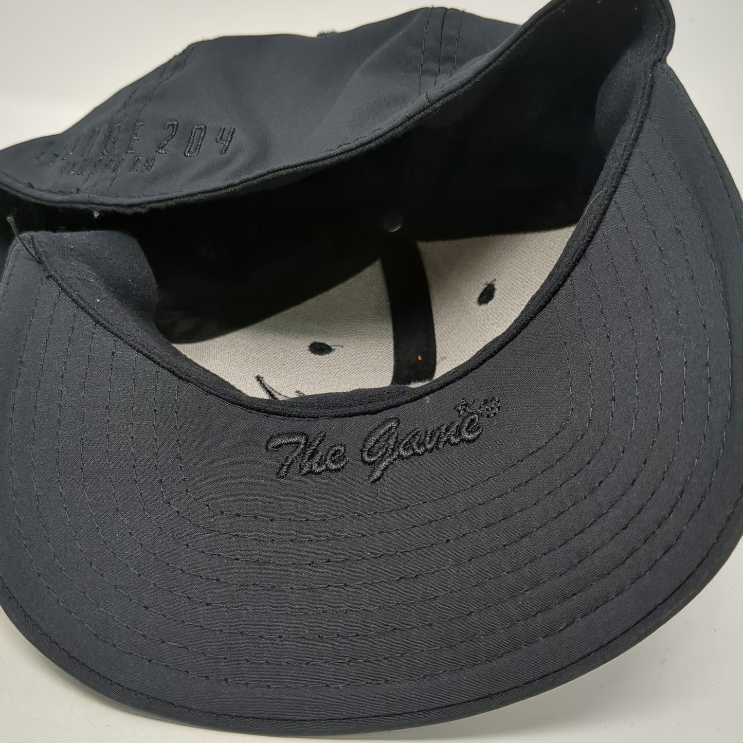 The Game Baseball Cap Black One Size Fitted Rhino Lounge 204 Jackson MS Hat 3D