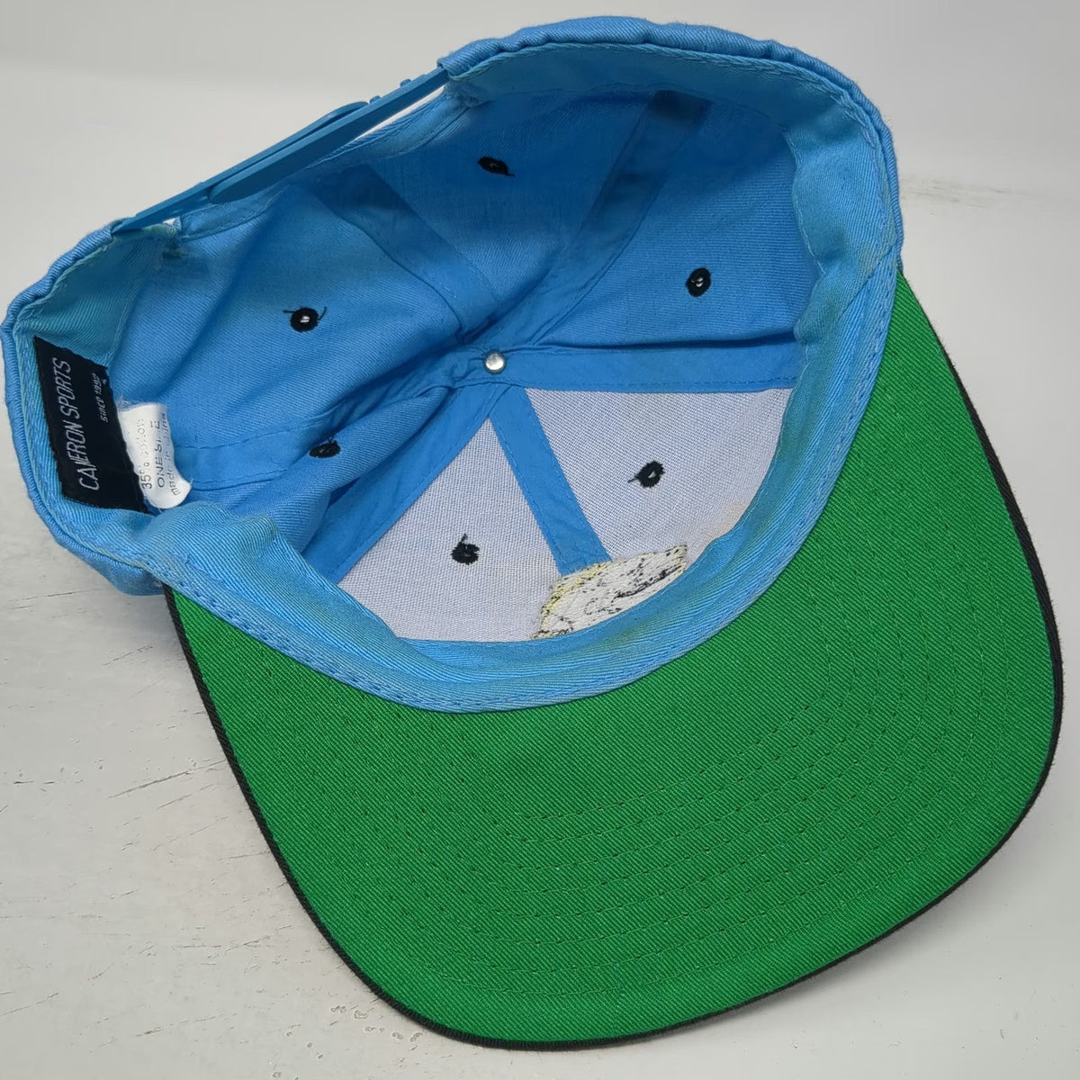 Cameron Sports Snapback Blue Black One Size Green Underbrim Caveman Graphic Hat