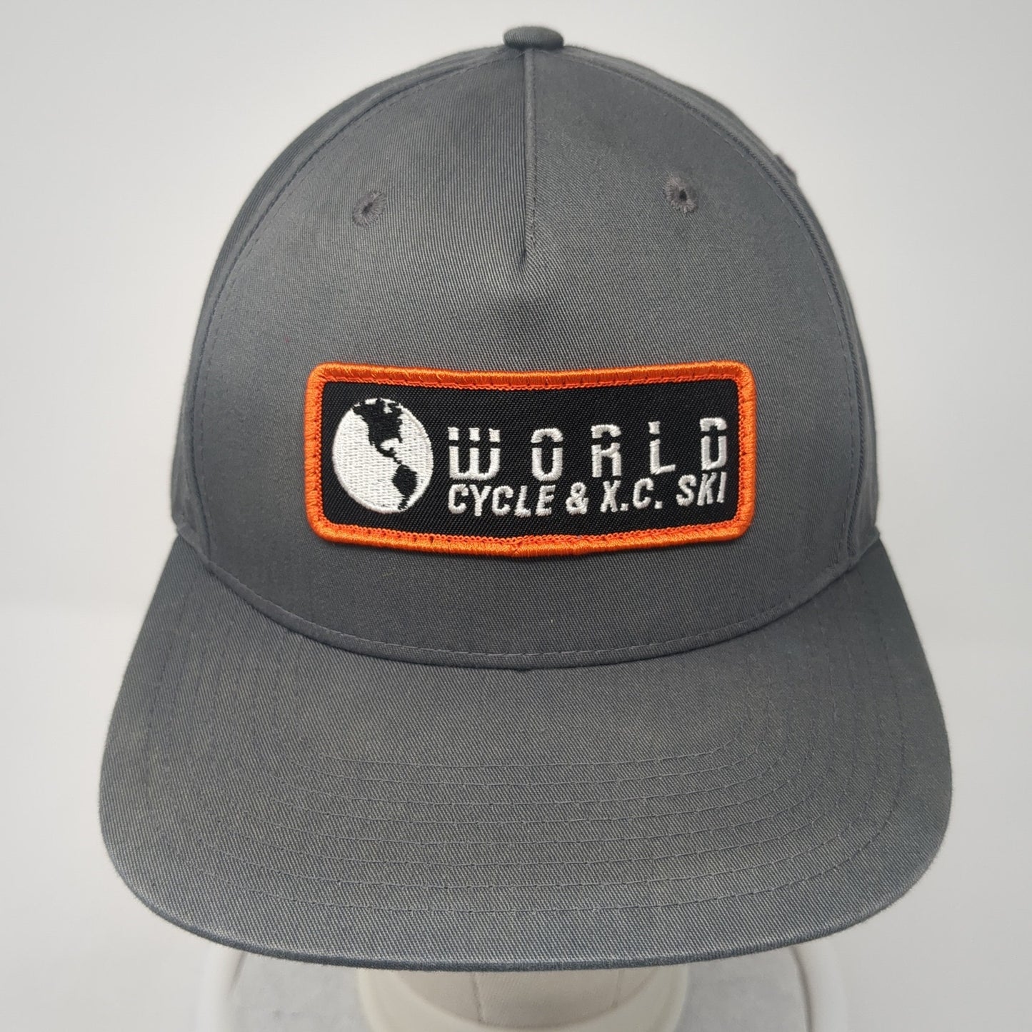 World Cycle & XC Ski Patch Snapback Hat Gray One Size Solid Outdoor