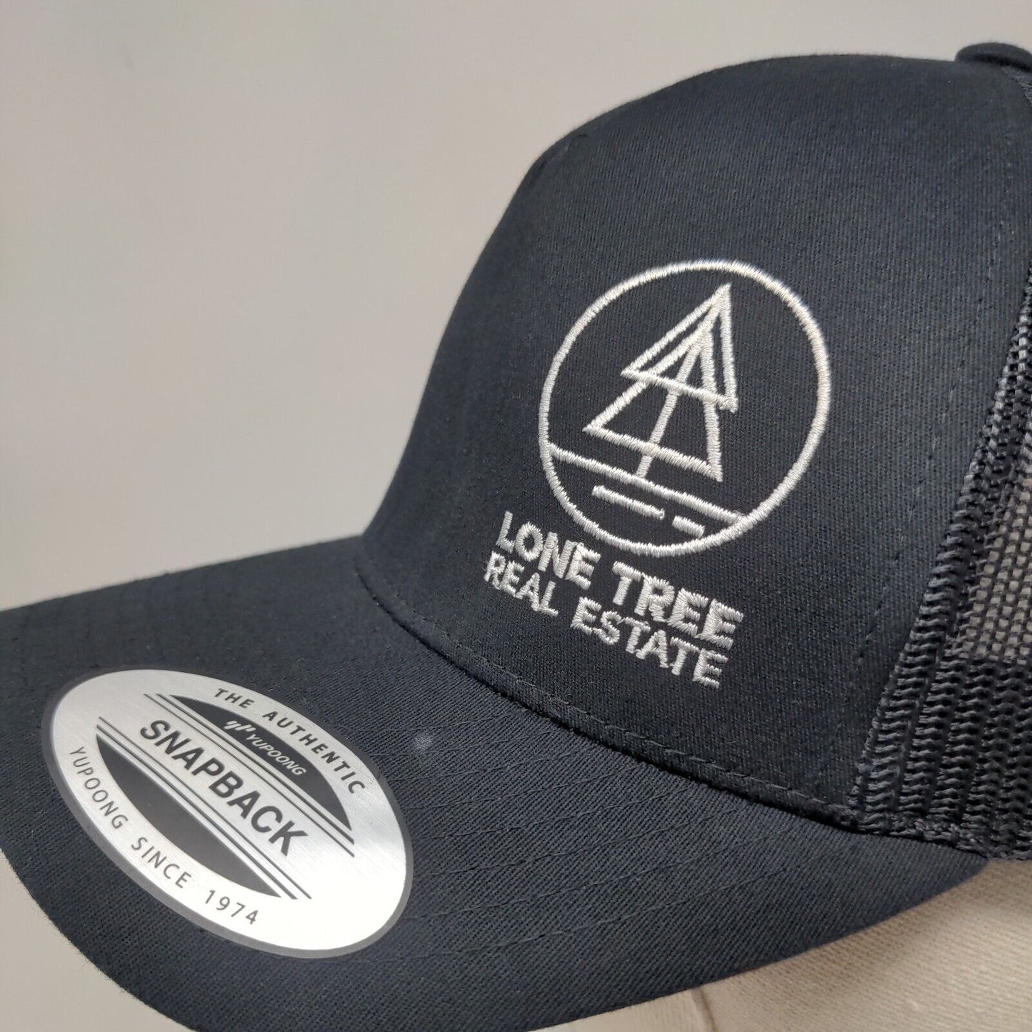 Lone Tree Real Estate Snapback Trucker Hat Black One Size The Classic Yupoong
