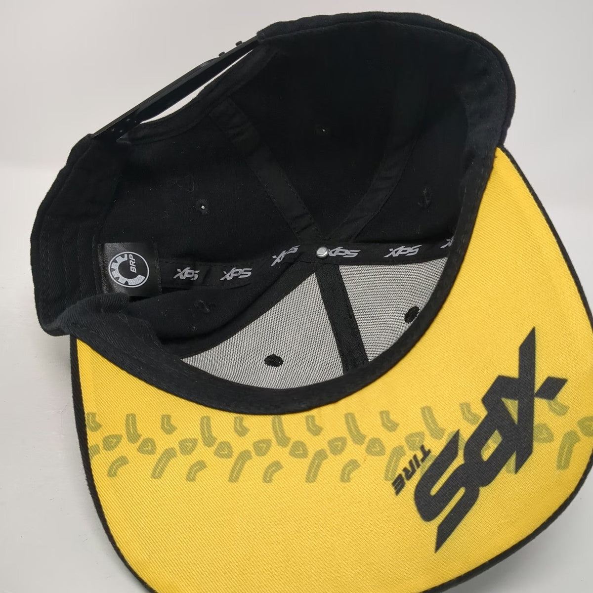 BRP Can-Am Snapback Hat Black One Size XPS Tire 50th Anniversary Graphic Brim