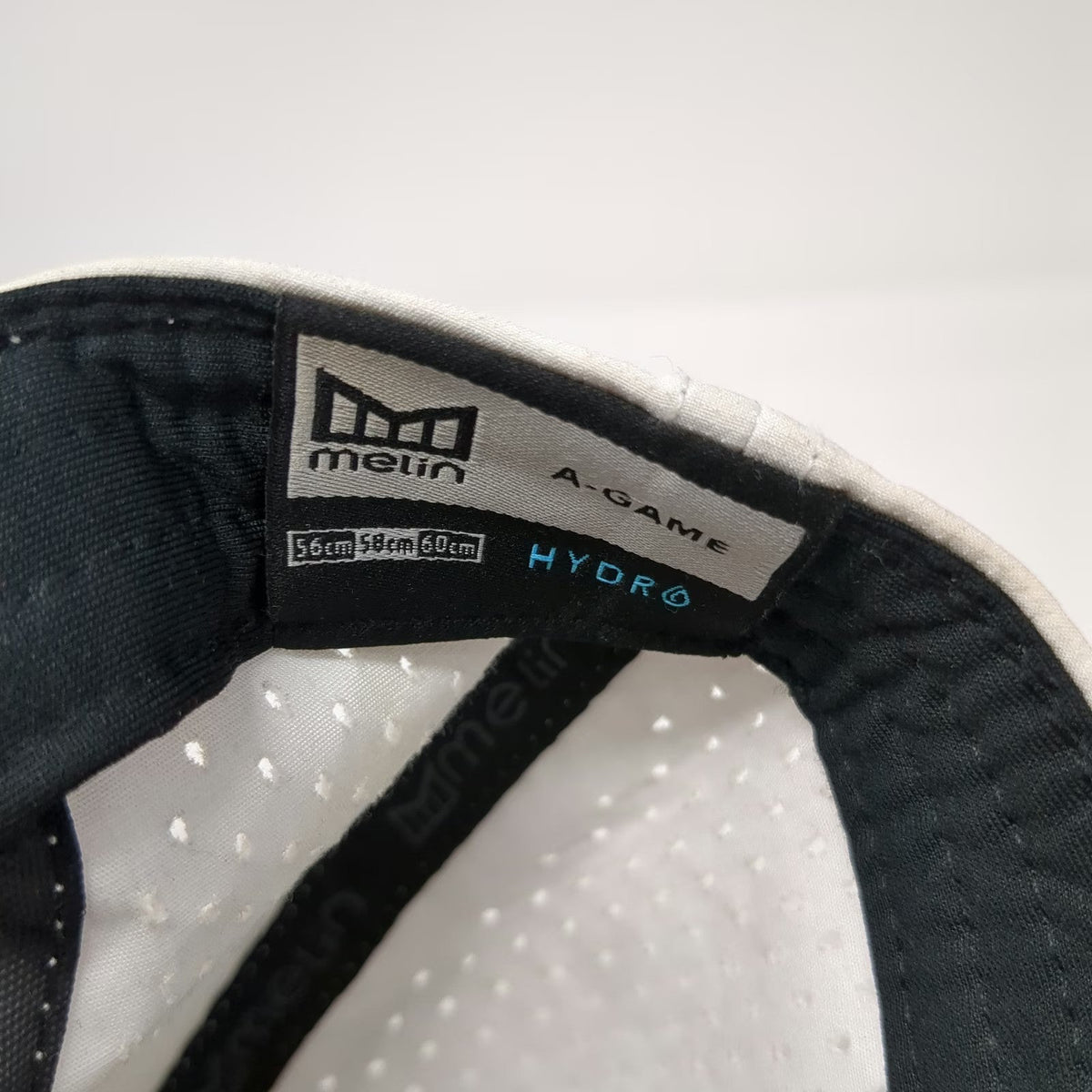 Melin Trucker Hat White One Size Perforated Performance Snapback Hydro A-Game