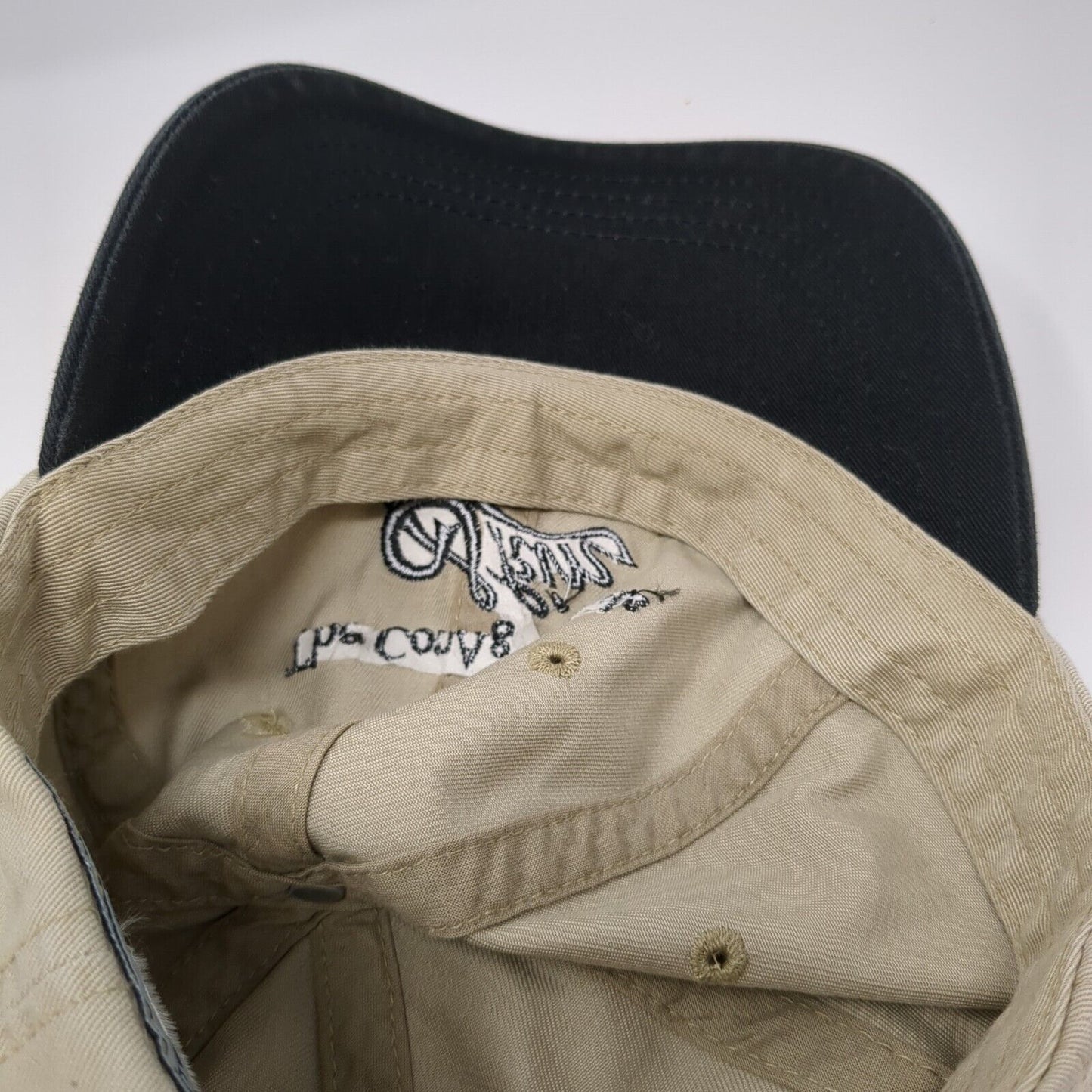 The ConAgra Foods Skin Game Slideback Hat Tan OS Adjustable Embroidered Imperial