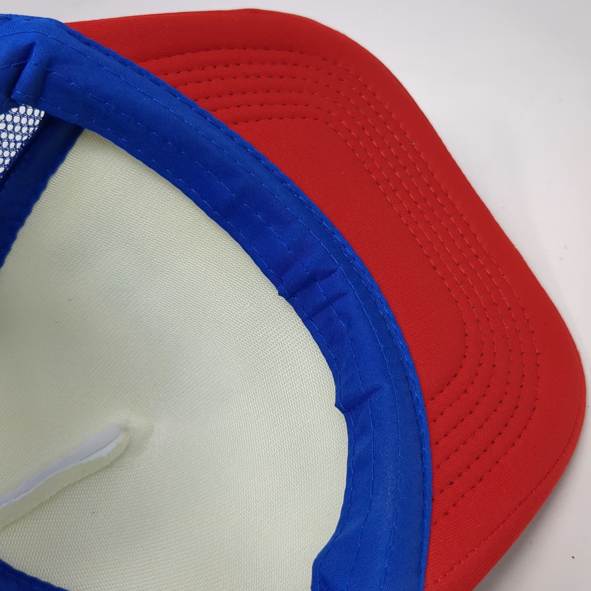 The Lord of the Wigs White Blue Red Trucker Hat One Size Merica Flag Graphic