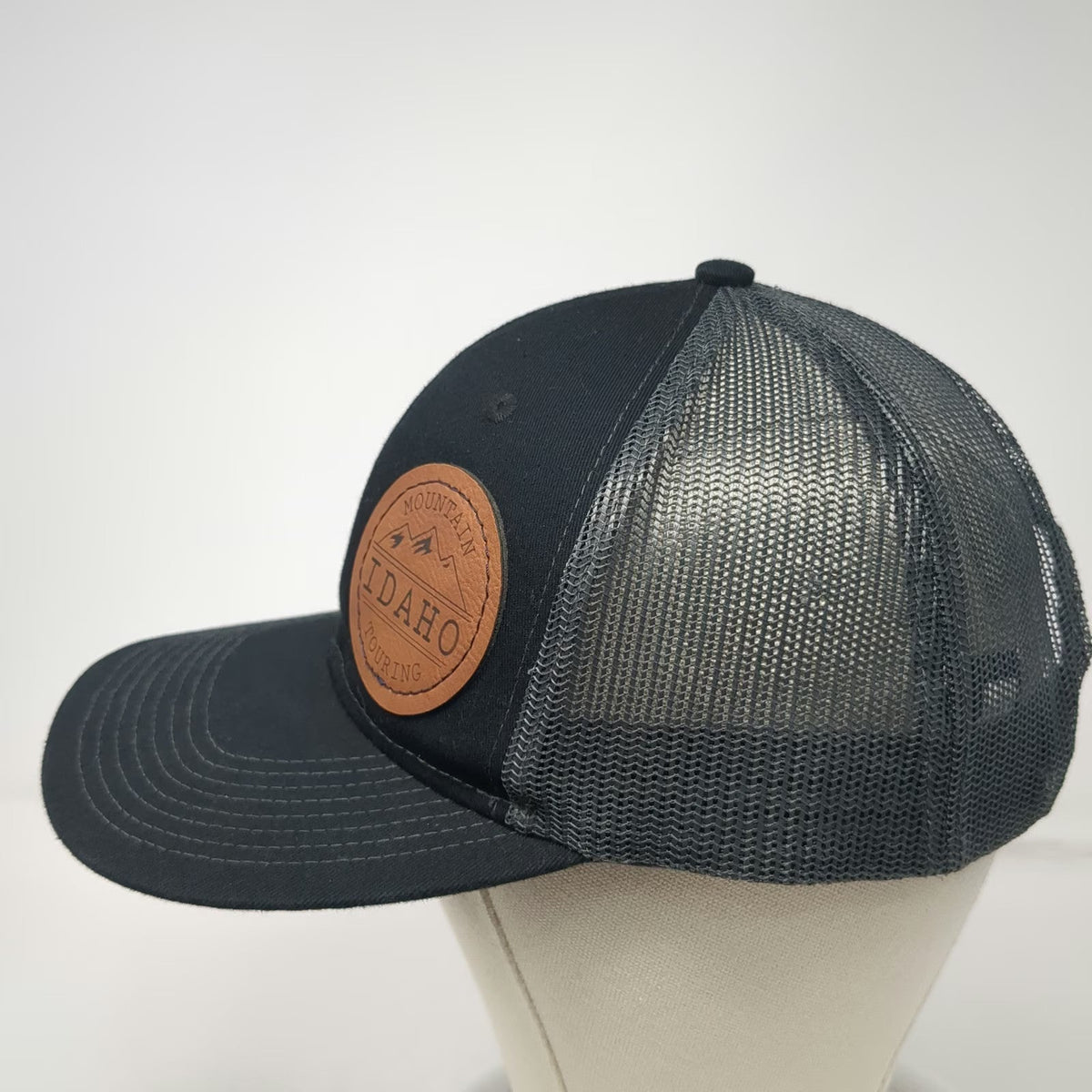 Port Authority Trucker Hat Black One Size Leather Patch Mountain Idaho Snapback