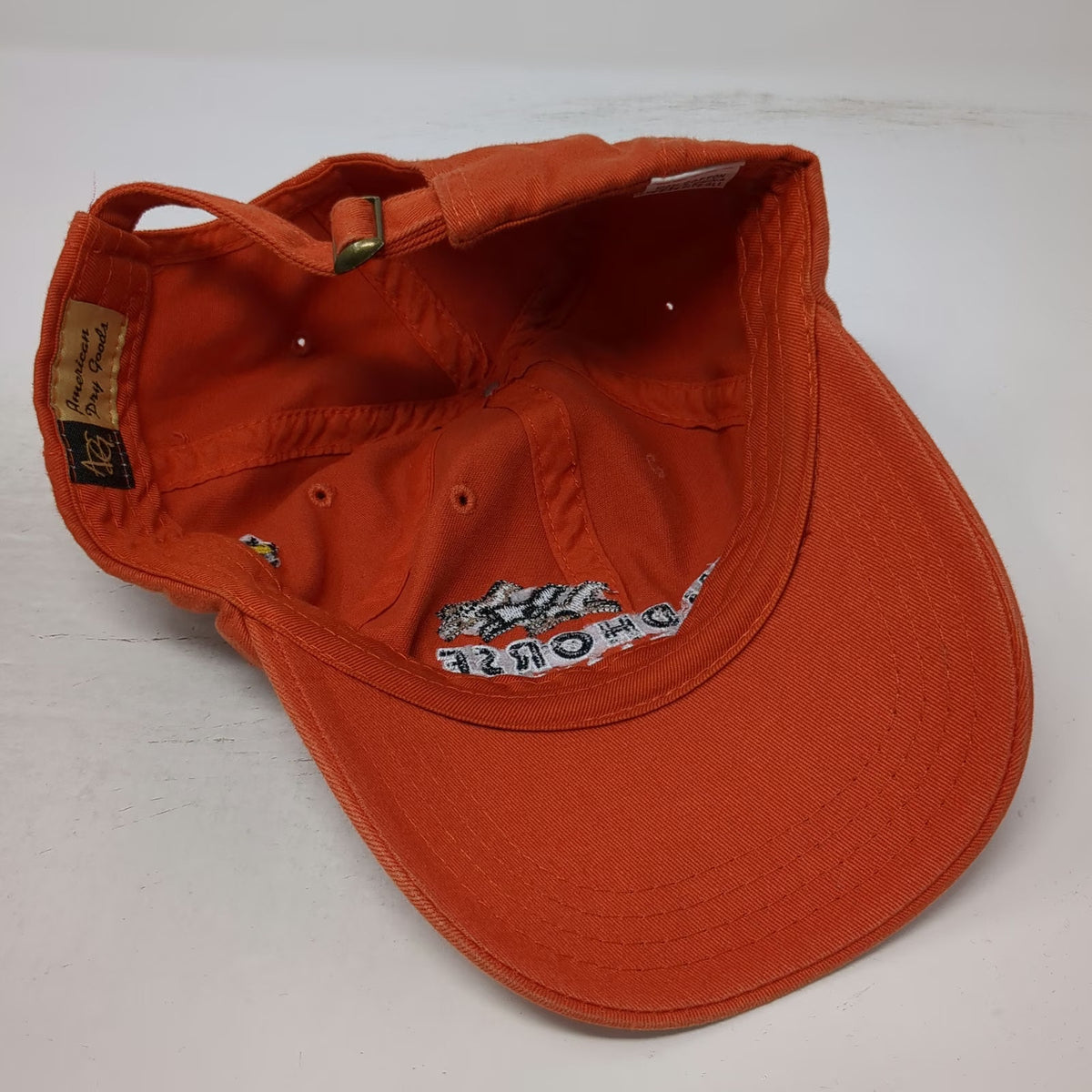American Dry Goods Wildhorse Resort Casino Orange One Size Baseball Cap Bird Hat