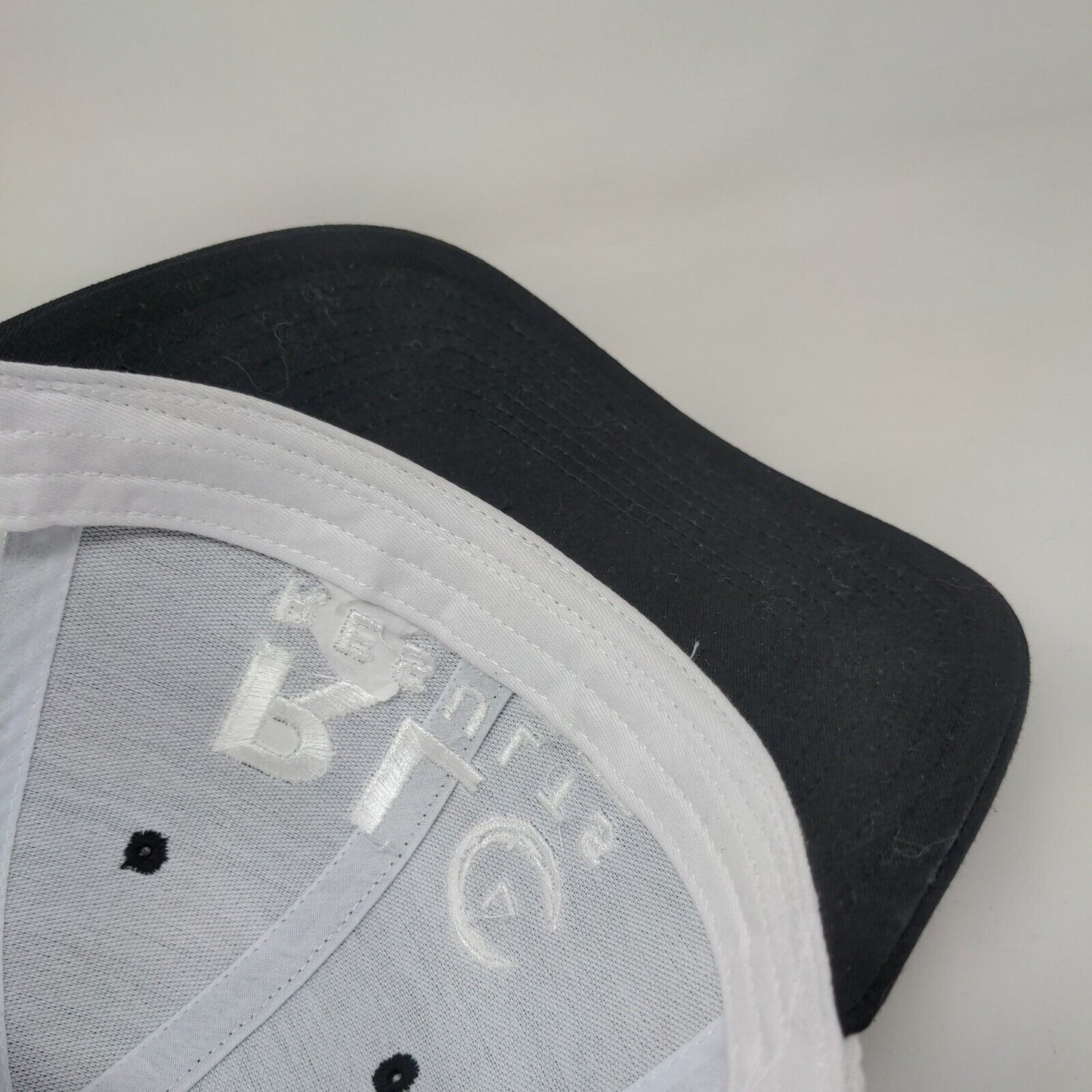 RLC Results Learning Center Snapback Trucker Hat Black One Size Richardson
