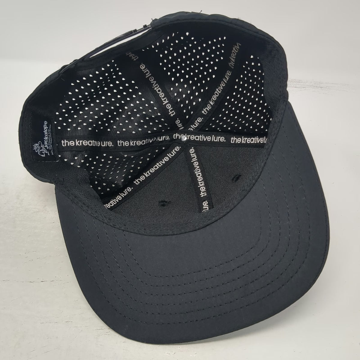 Jackalope Trucker Hat Black One Size Laser Perforated Mesh Snapback Rubber Patch