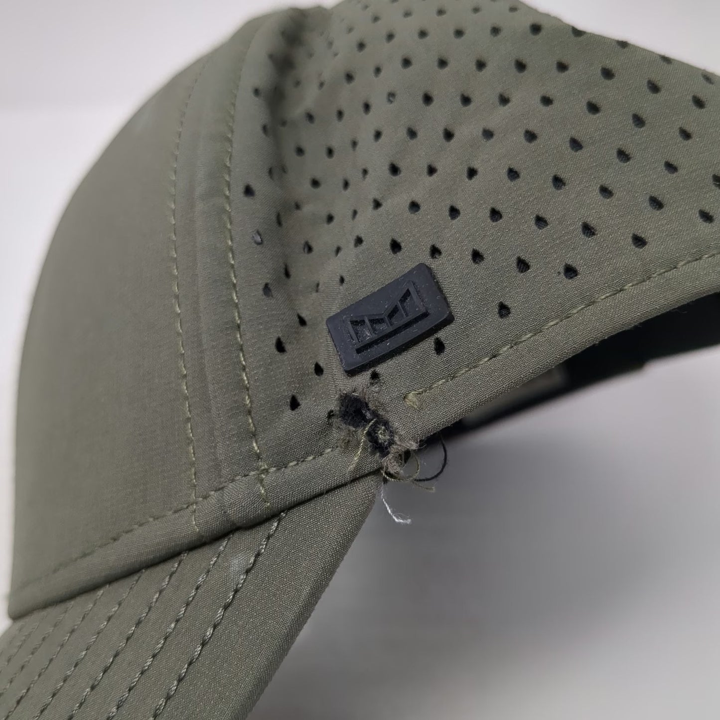 Melin Baseball Hat Green 60 CM Perforated Hydro Snapback Performance A-Game