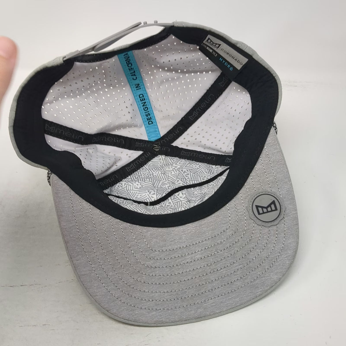 Melin Coronado Hydro Trucker Hat Gray L Snapback Rope Perforated Performance