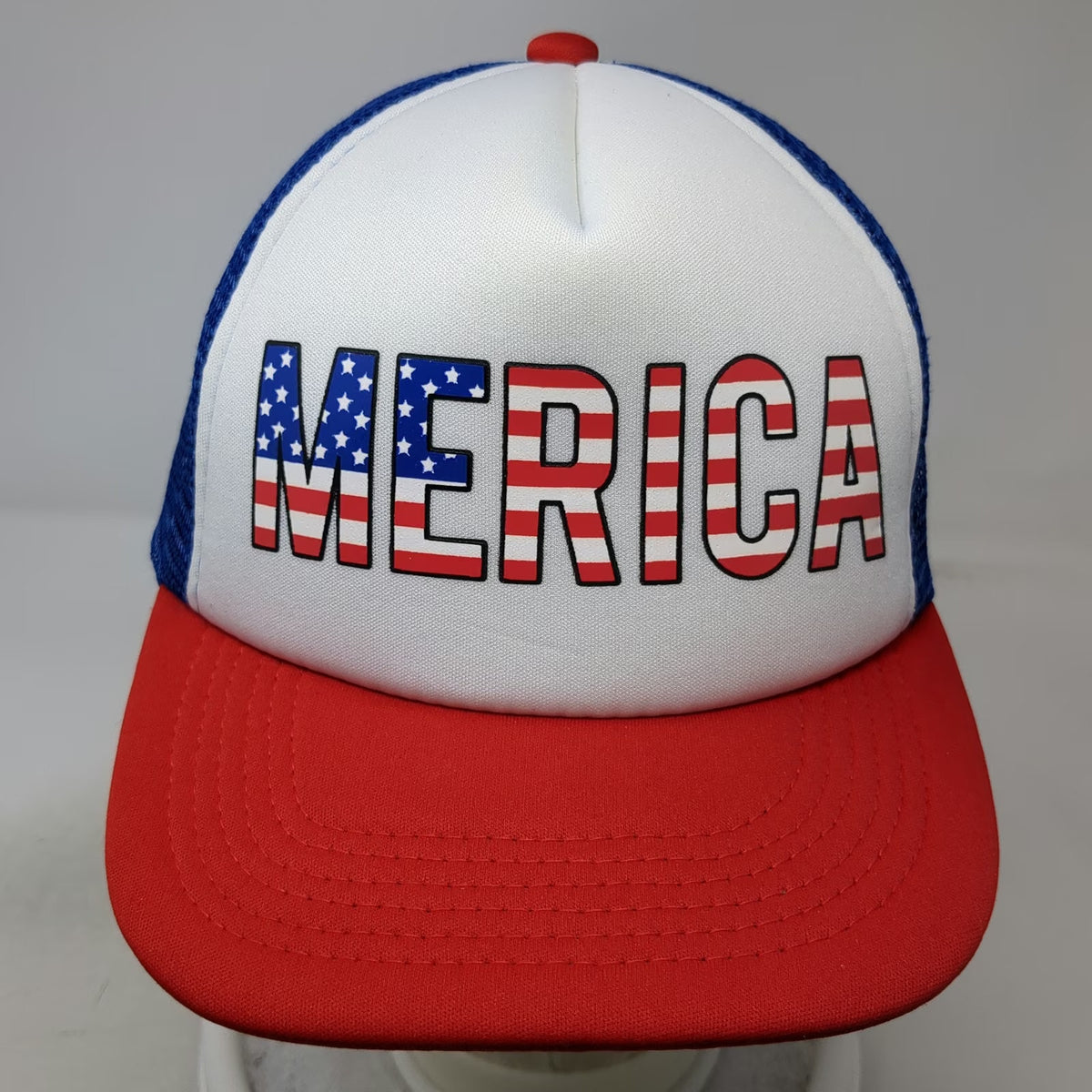 The Lord of the Wigs White Blue Red Trucker Hat One Size Merica Flag Graphic