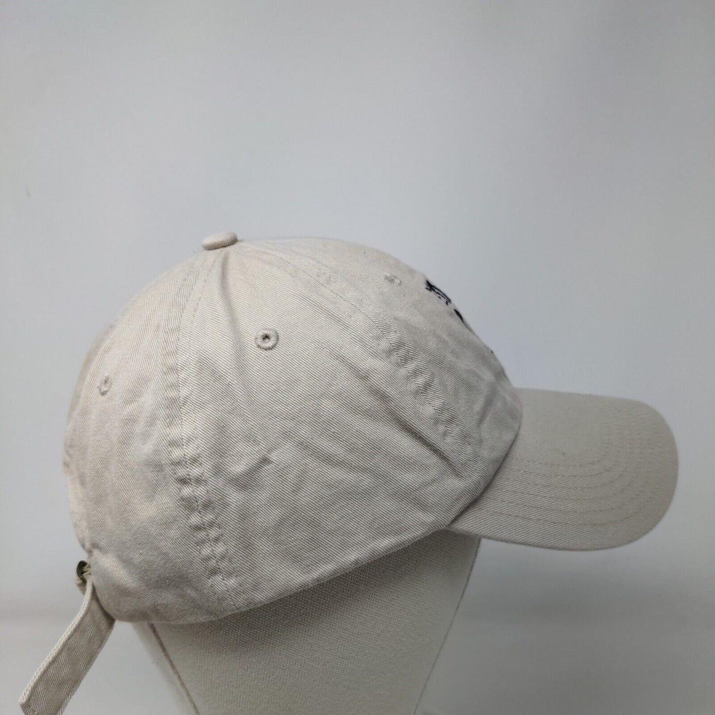 The Magnolia Roots Slideback Hat Tan One Size Embroidered 6 Panel Big X
