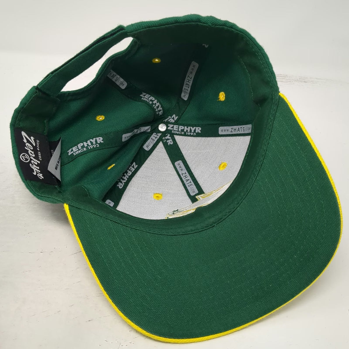 Zephyr Concordia Eagles NCAA Green Yellow One Size Strapback Cap Hat CUI Logo