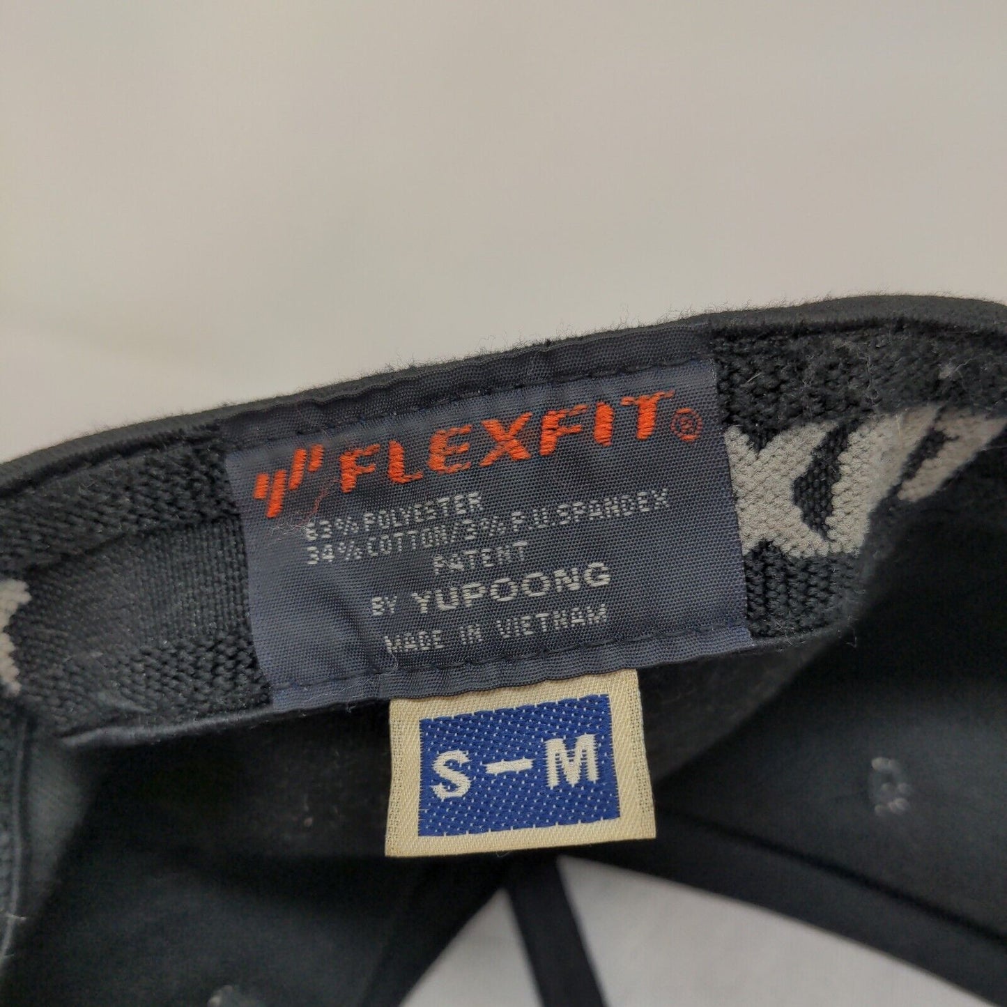Yupoong Flexfit Men's HPL Superior Lubricants Fitted Hat Black S-M Embroidered