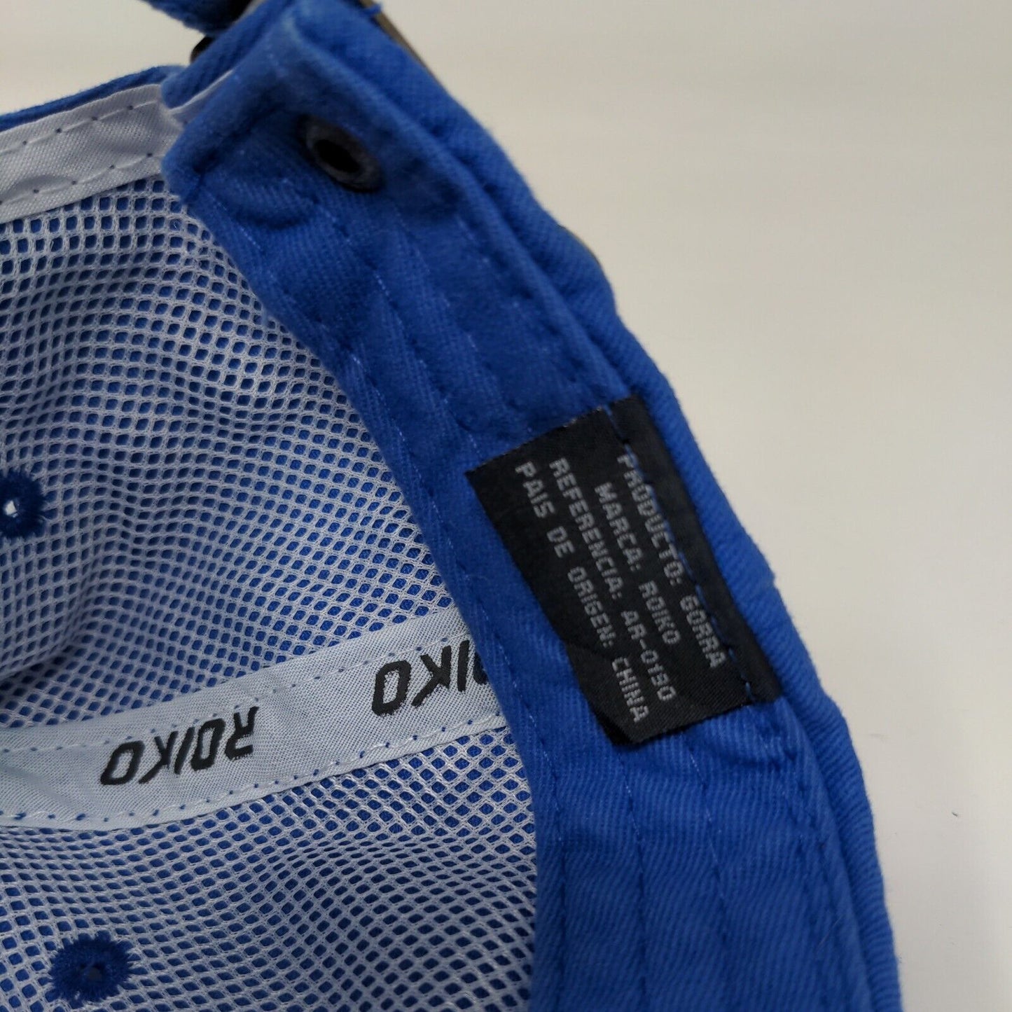 Roiko Slideback Hat Blue One Size Adjustable Emblem Vented Holes 6 Panel