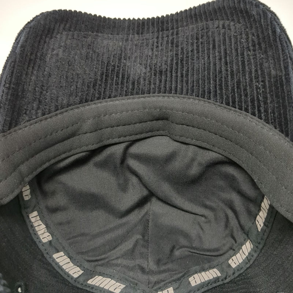 Unie 5 Panel Black Hat One Size Corduroy PestCo Logo Embroidered Slideback