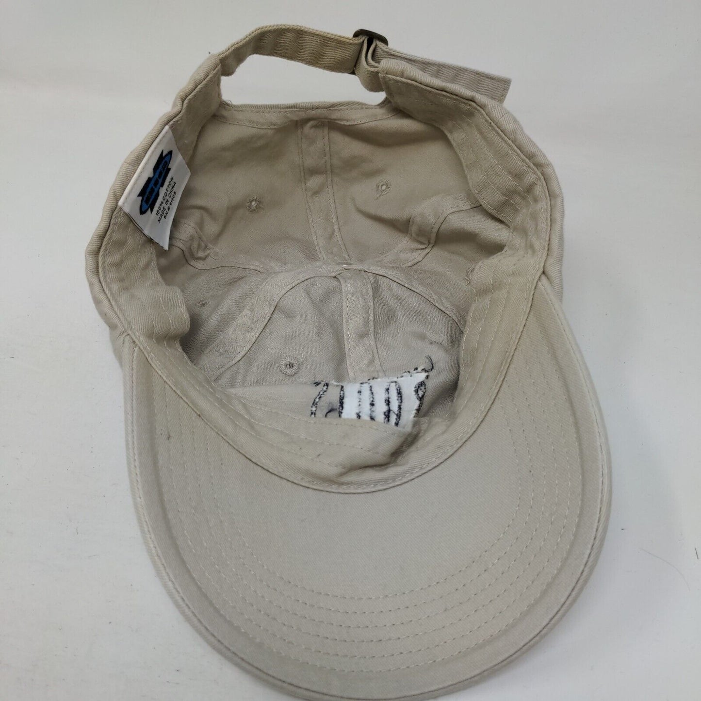 The Magnolia Roots Slideback Hat Tan One Size Embroidered 6 Panel Big X