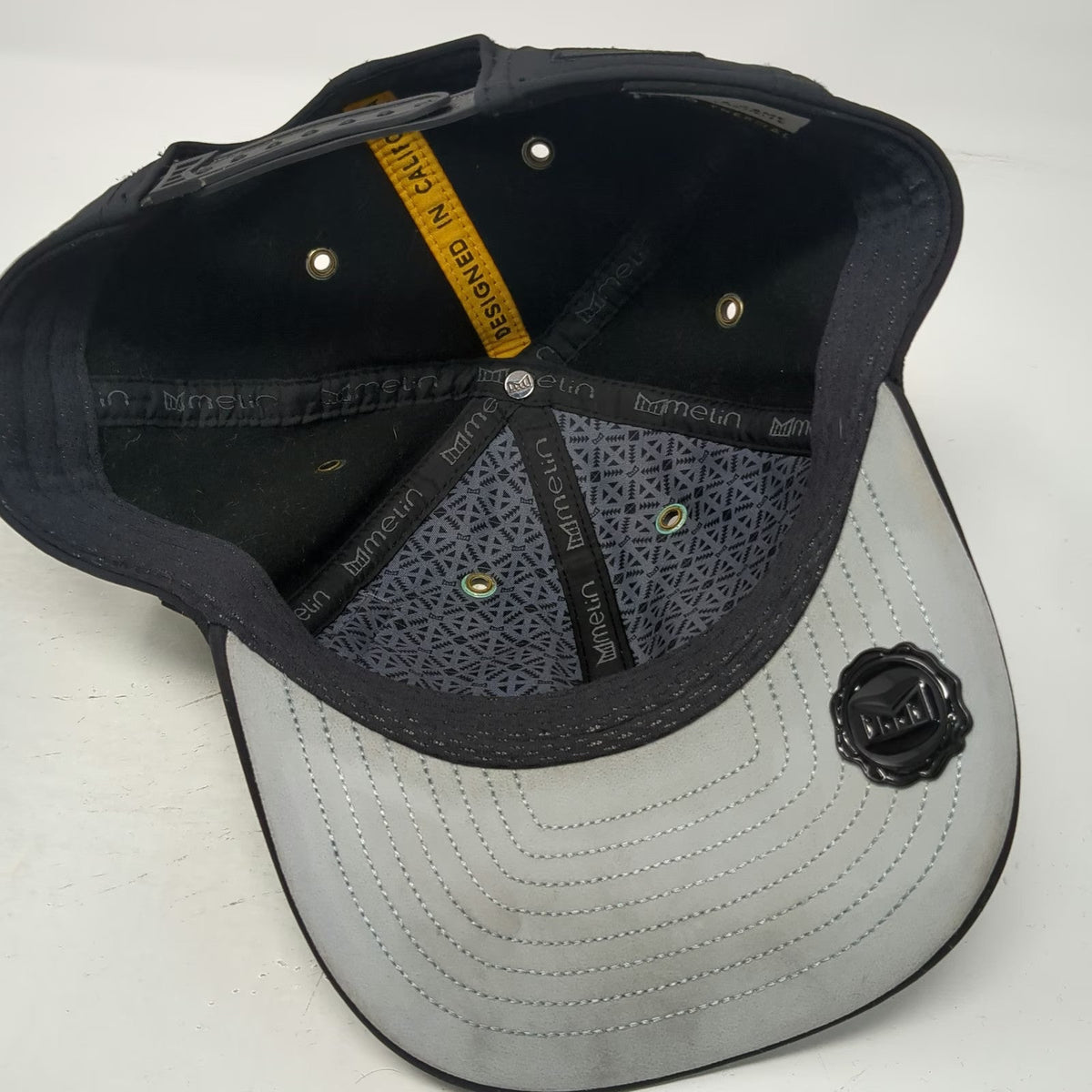 Melin Trucker Hat Black L A-Game Infinite Thermal Snapback Water Resistant Hat