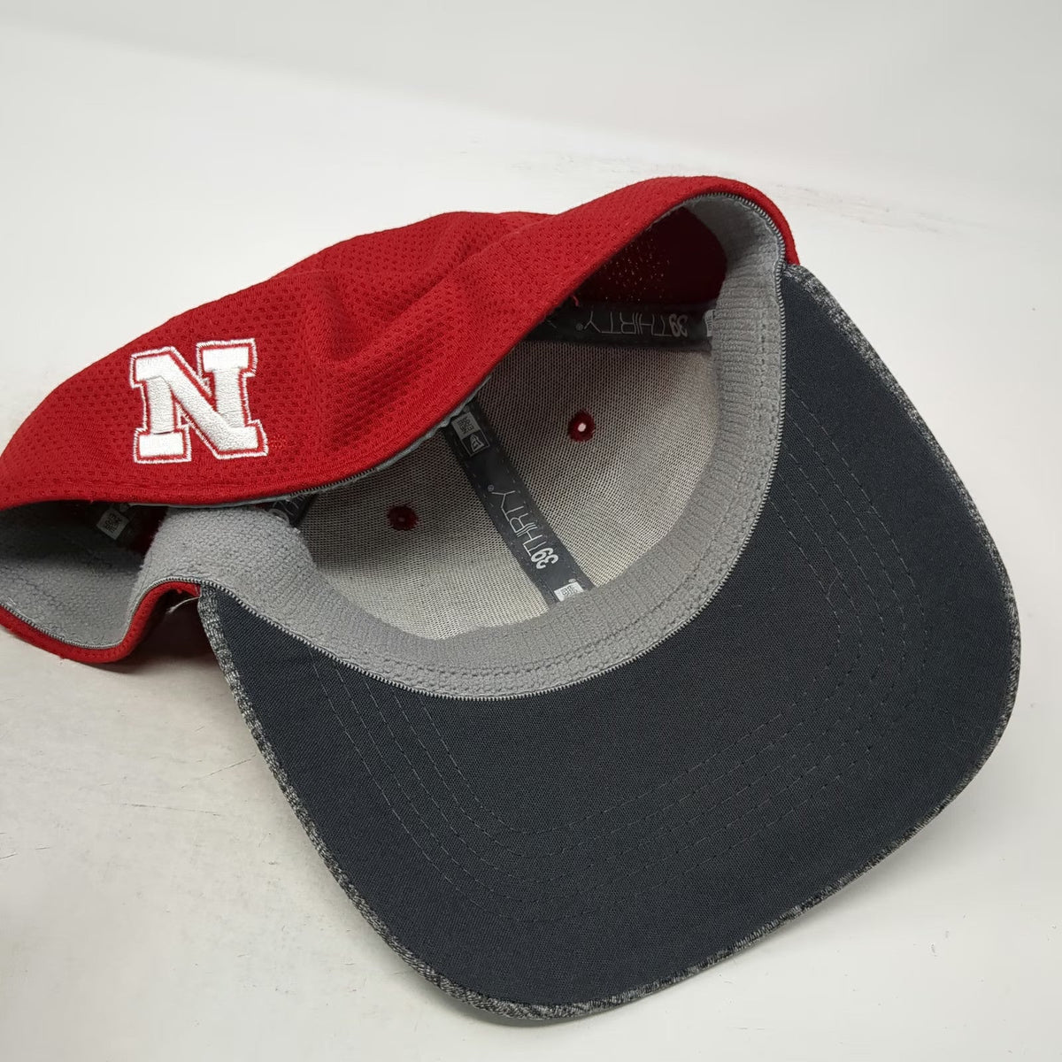 Nebraska Cornhuskers NCAA New Era Red Gray L Hat 39THIRTY Stretch Curved Brim
