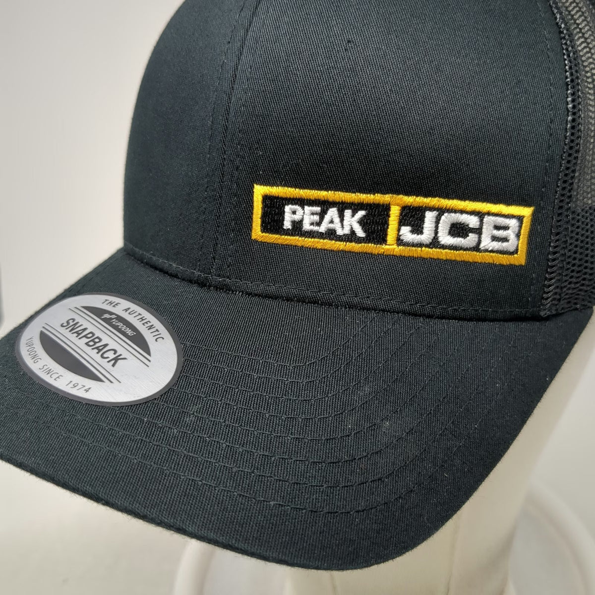 Yupoong Trucker Hat Black One Size Snapback Mesh Back Peak JCB Logo Structured