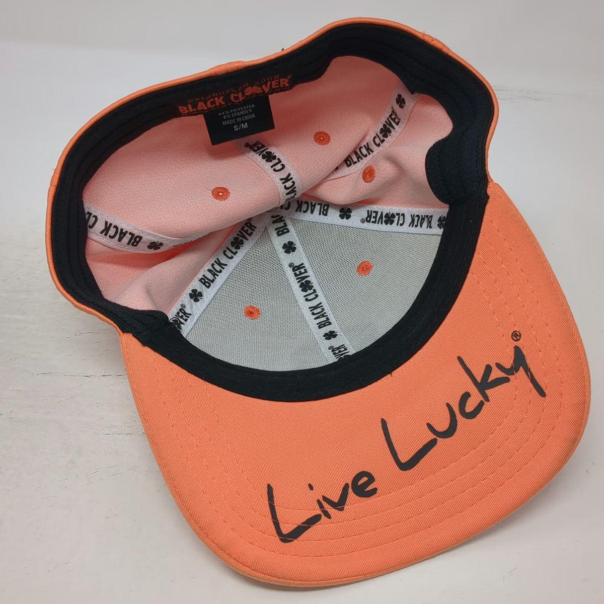Black Clover Baseball Cap Orange One Size Stretch Fit Live Lucky Clover Logo Hat