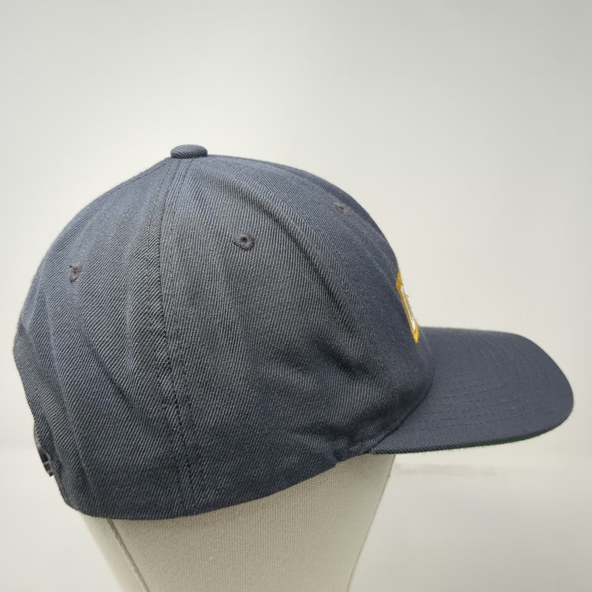 Yupoong Dion and Sons Inc Trucker Hat Gray One Size Snapback Green Under Brim