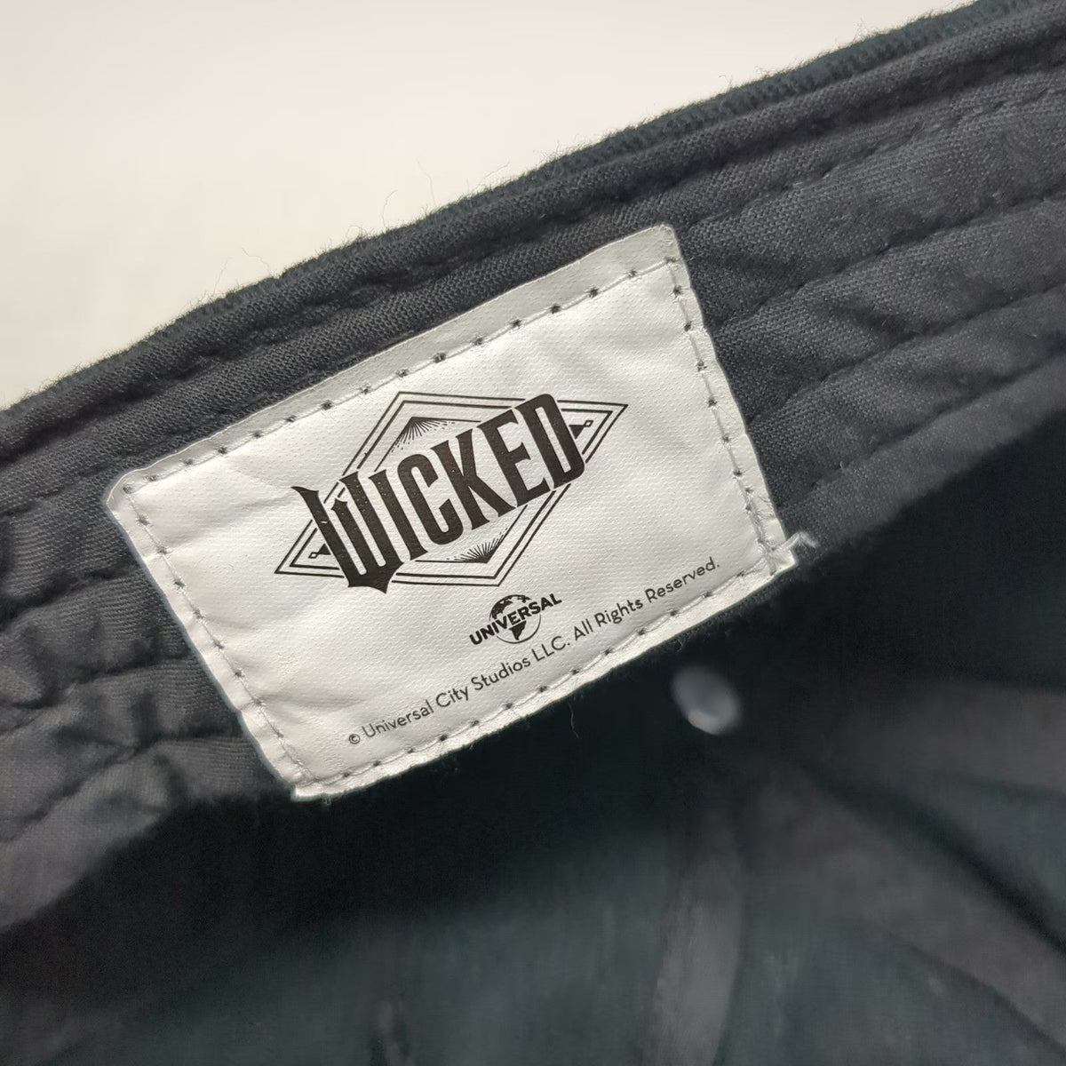 Universal Wicked 5 Panel Black One Size Glitter Logo Slideback Hat Broadway