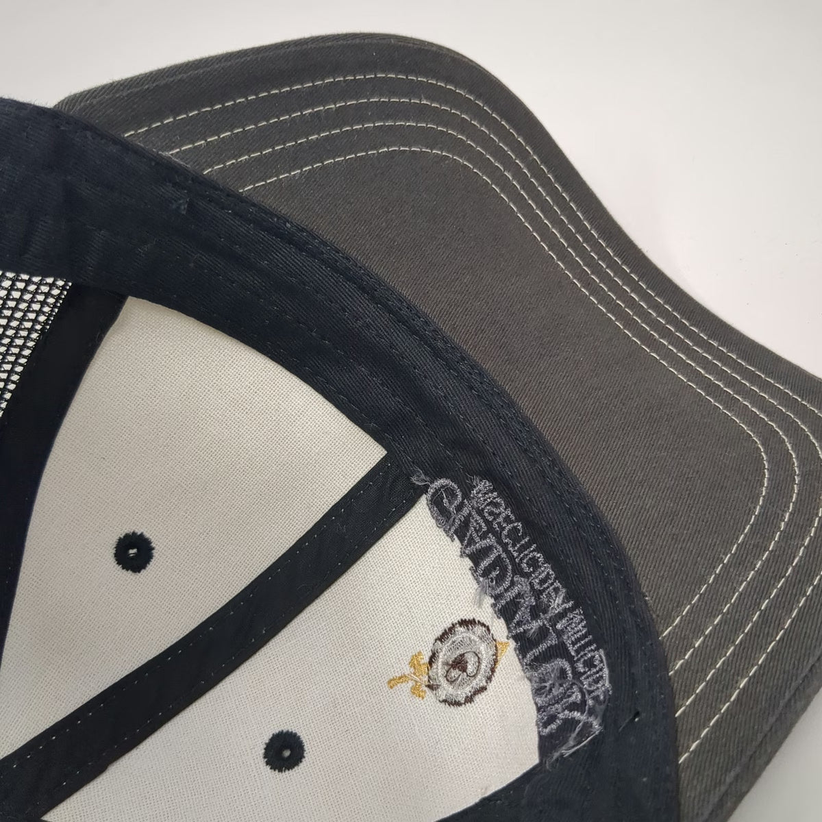 District Trucker Hat Beige Black One Size Gladiator Miticide Mesh