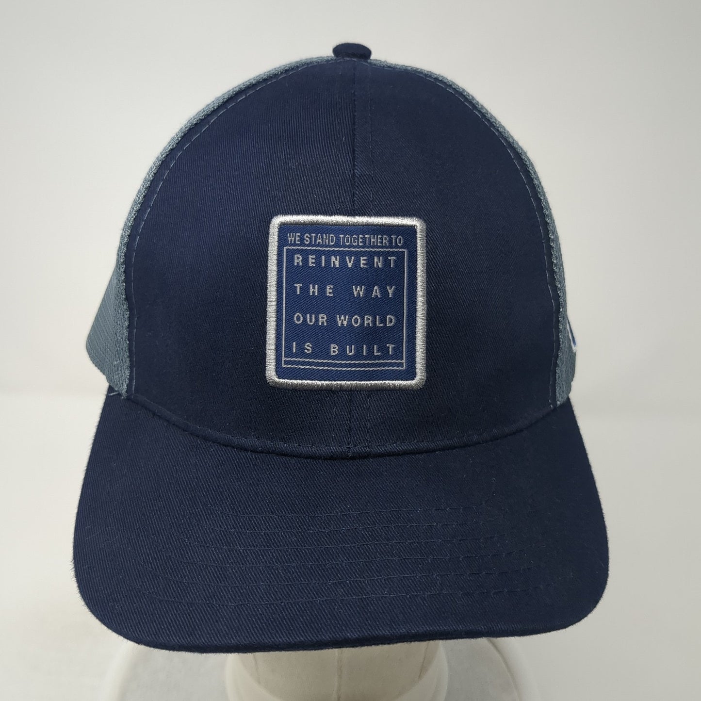 We Stand Together Reinvent The Way Our World Is Built Trucker Hat Blue OS Mesh