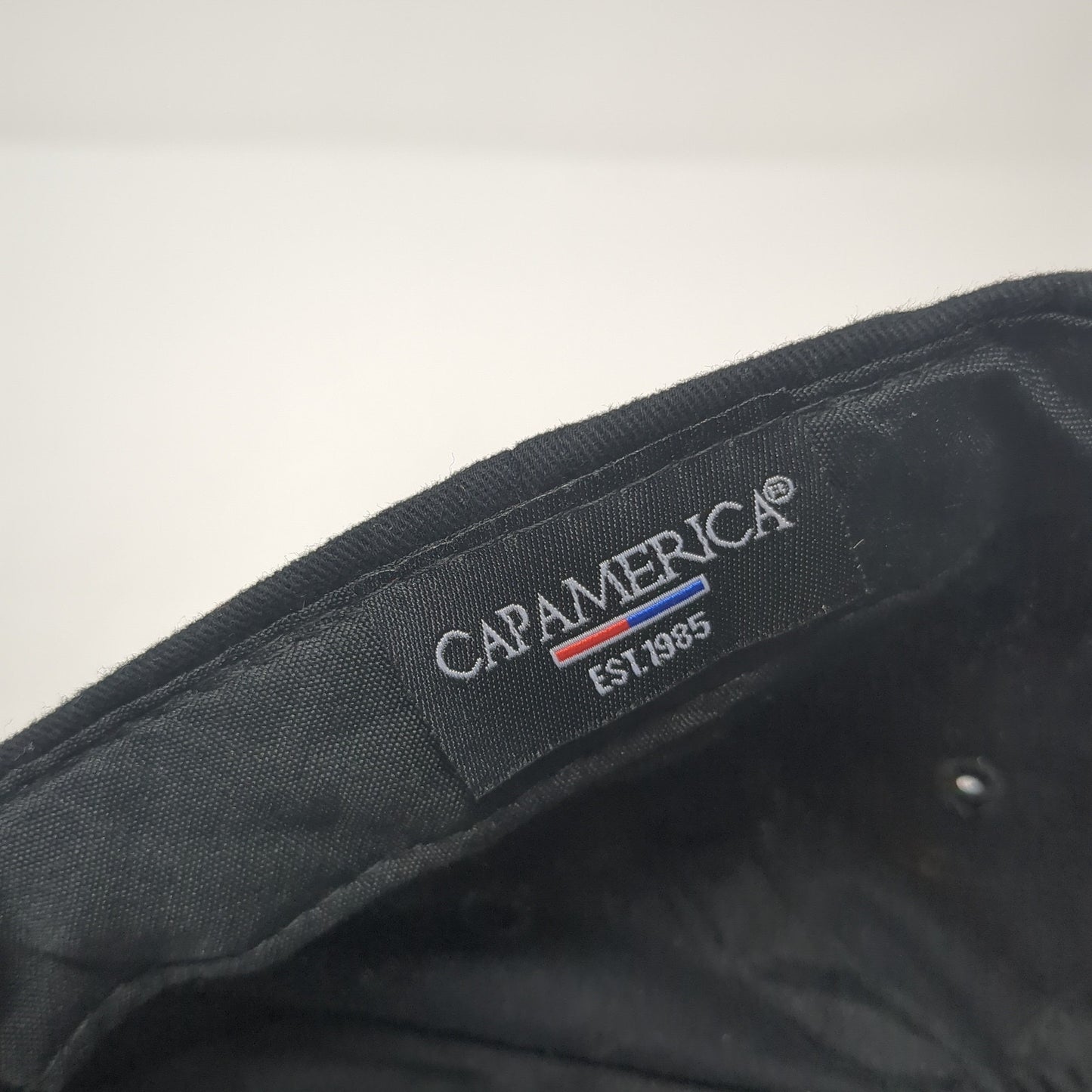 Improving It's What We Do Strapback Hat Black One Size Cap America