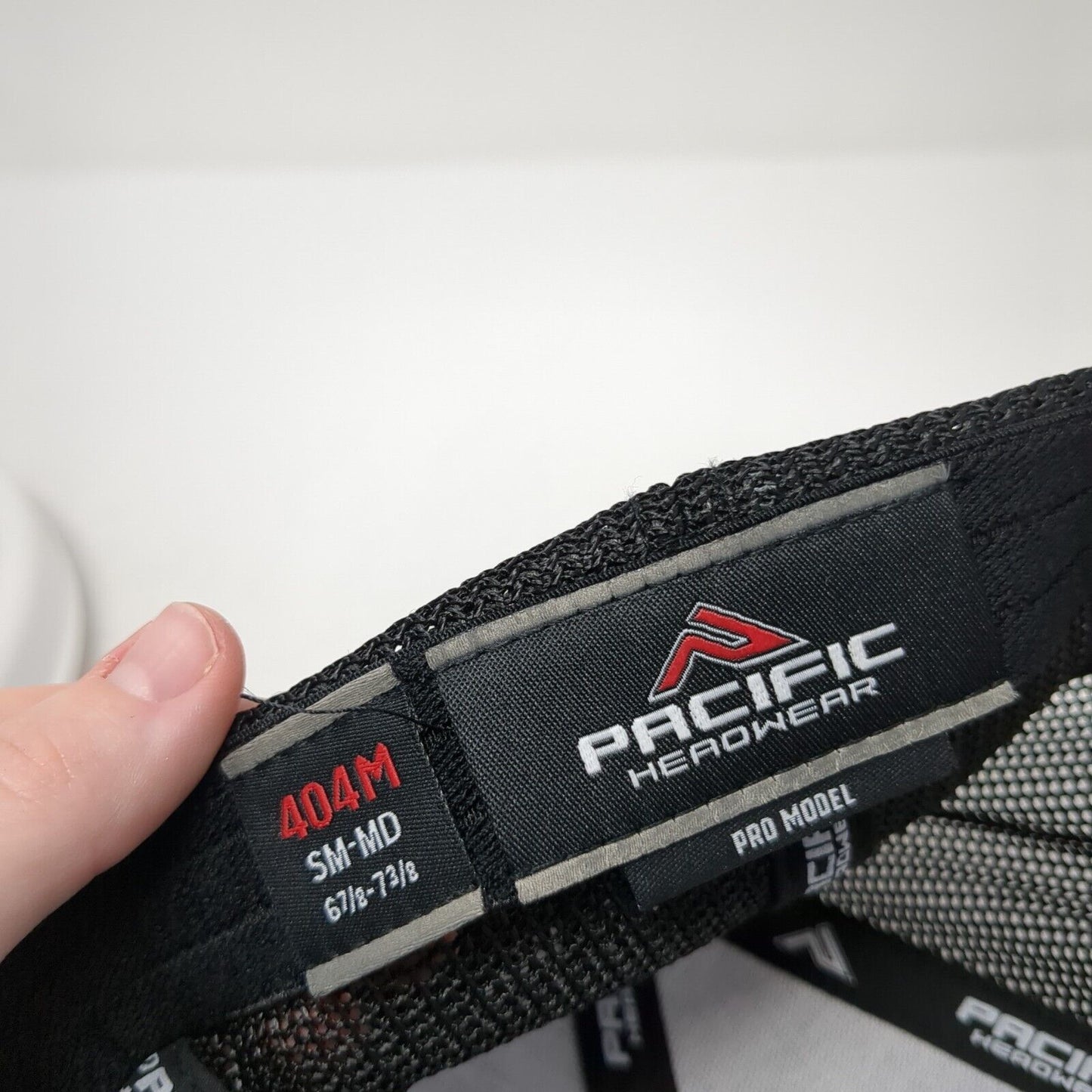 Pacific Headwear Fitted Mesh Back Trucker Hat Black 6 7/8-7 3/8 Logo