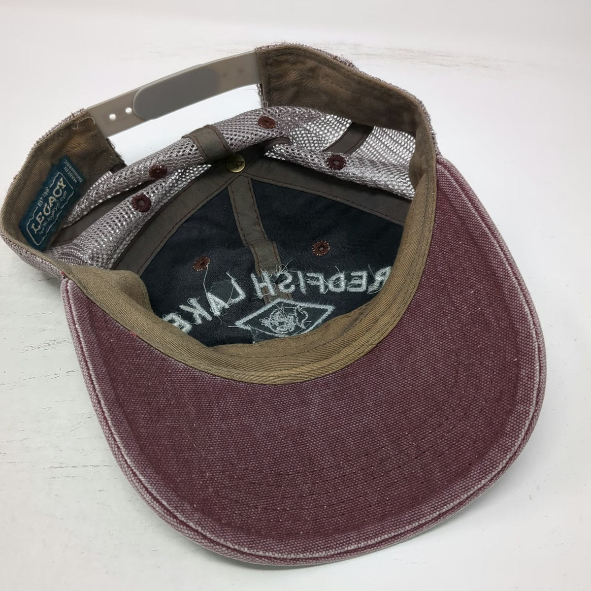Legacy Redfish Lake Lodge Trucker Hat Red One Size Mesh Snapback Fish Logo