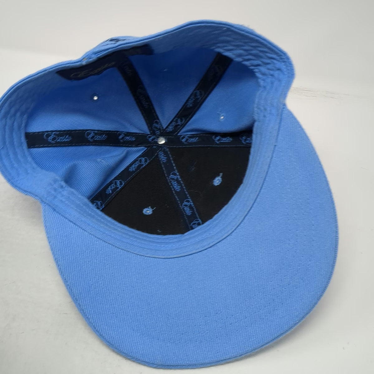 Exsto Blue Baseball Cap 7 1/2 Fitted Flat Brim Graphic Logo Shield Crest Hat