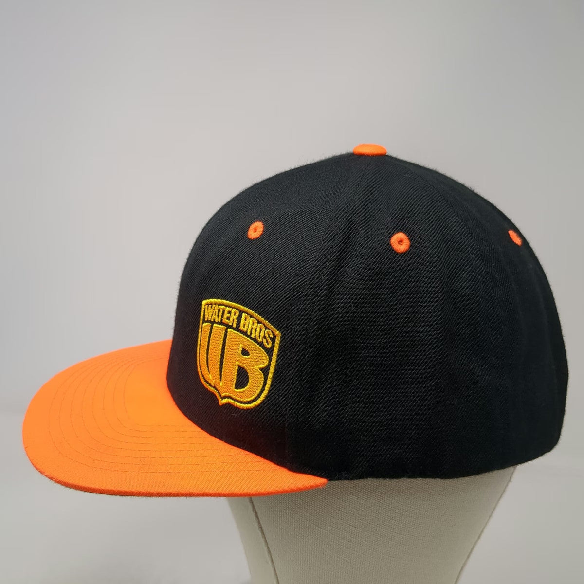 Yupoong Snapback Black Orange One Size Water Bros WB Logo Green Underbrim Hat