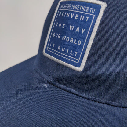 We Stand Together To Reinvent The Way Our World Is Built Trucker Hat Blue OSFA