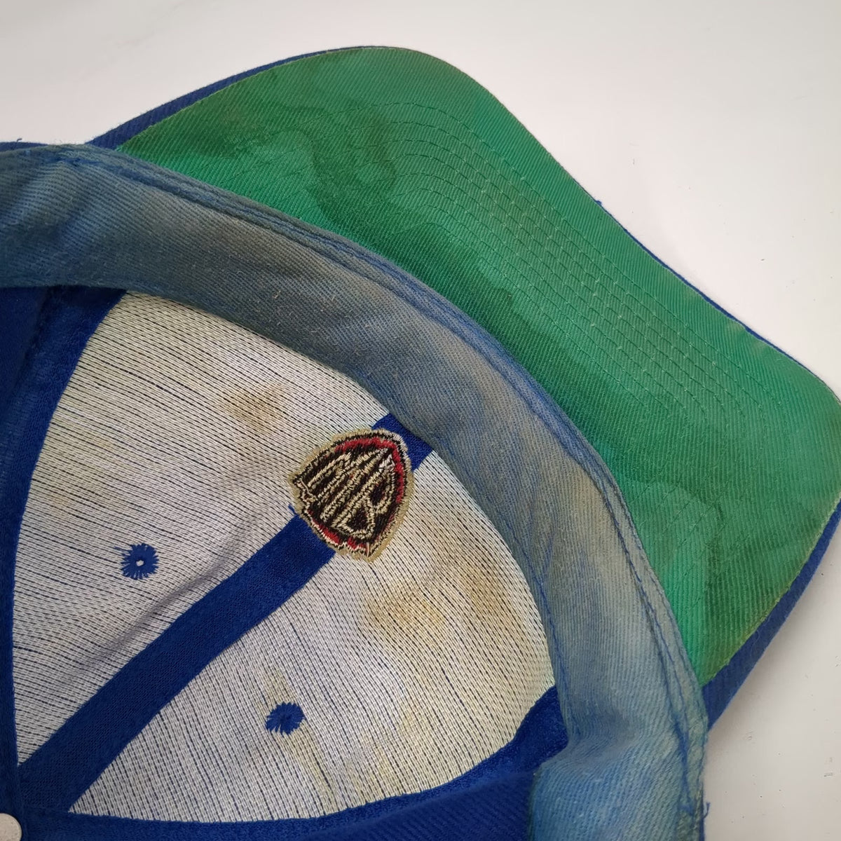 K-C Snapback Blue Hat One Size Warner Bros WB Shield Logo Green Underbrim