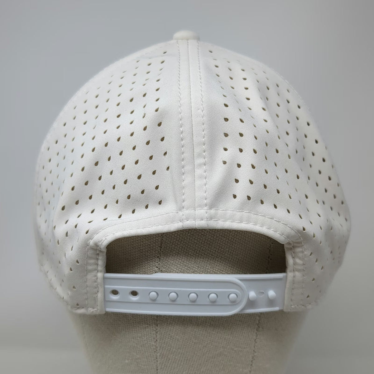 The Rock Store White Trucker Hat One Size Perforated Performance Snapback Hat