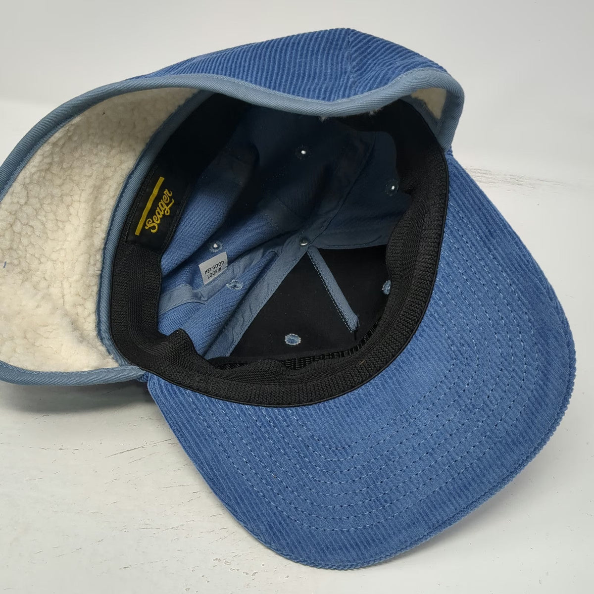 Seager 5 Panel Blue Hat One Size Corduroy Ear Flaps Sherpa Lined Script Patch