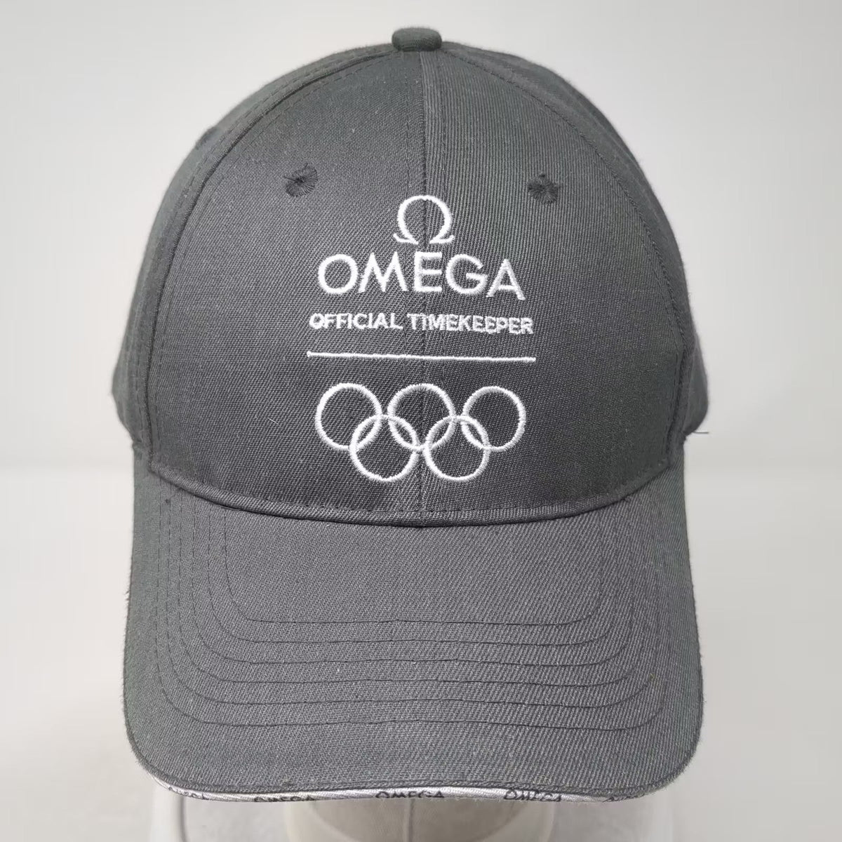 Omega Olympic Games Official Timekeeper Logo Gray White OSFA Slideback Cap Hat